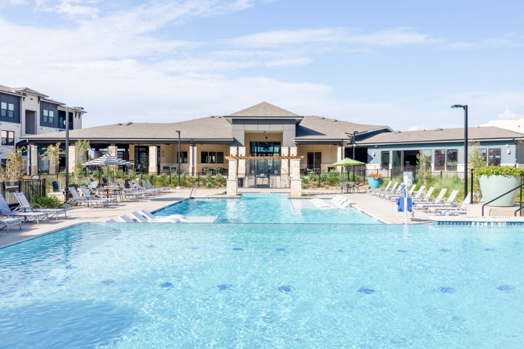 Resort-style pool and clubhouse at the Residences of Siena South in Round Rock, TX